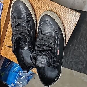 Well Worn, leather like shoes I am a women's 13 these shows are a men's 11